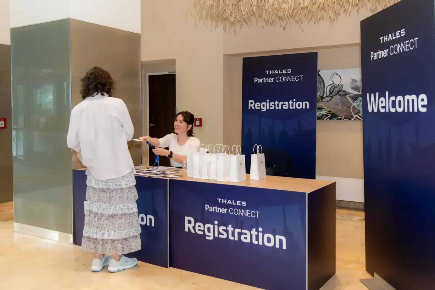 Eventfotografin dokumentiert die Registrierung bei Thales Partner CONNECT Event in Wien